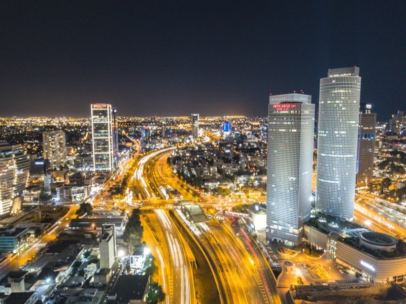 The Tel Aviv skyline and Ayalon Highway at night