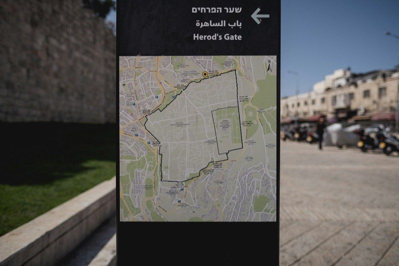 A map of the Old City of Jerusalem on a street sign
