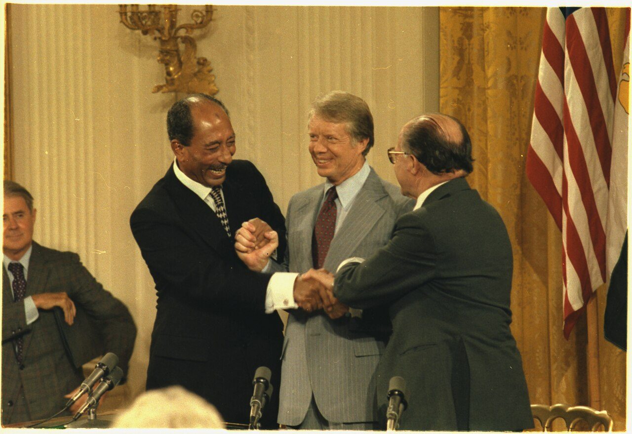 President Carter with the leaders of Israel and Egypt at the Camp David Accords