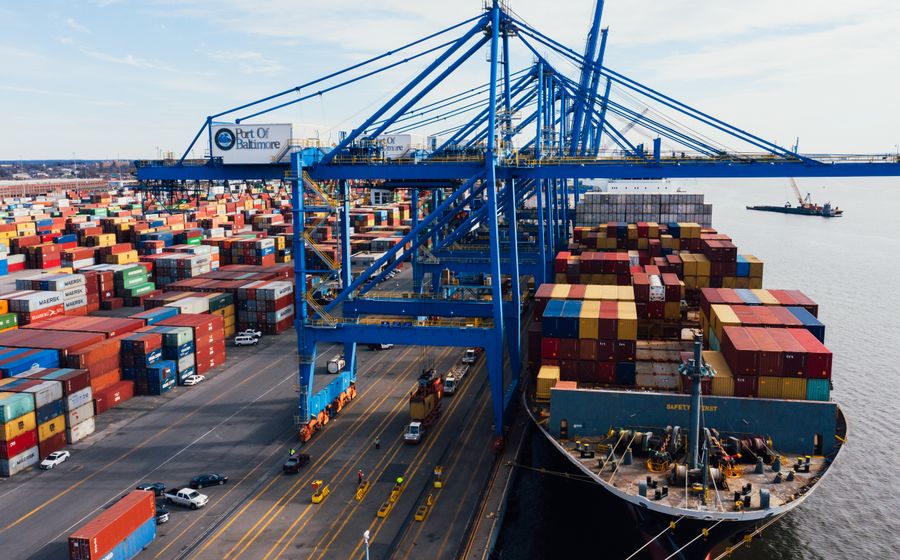 A cargo ship and shipping containers at a U.S. port